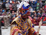 Mustang Lo Manthang Tiji Festival Day 2 06 Masked Dancer Three dancers in colourful costumes with animal heads with long protruding tongues entertained the crowd on day two of the Tiji Festival in Lo Manthang.